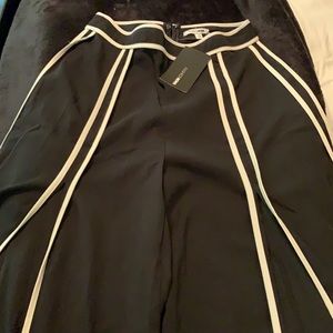 Stylish beautiful Fashion Nova wide split pants.